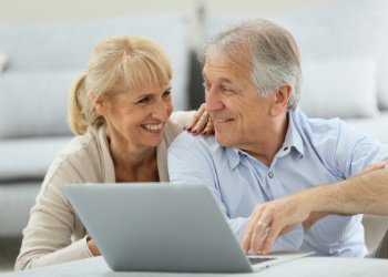 couple using laptop