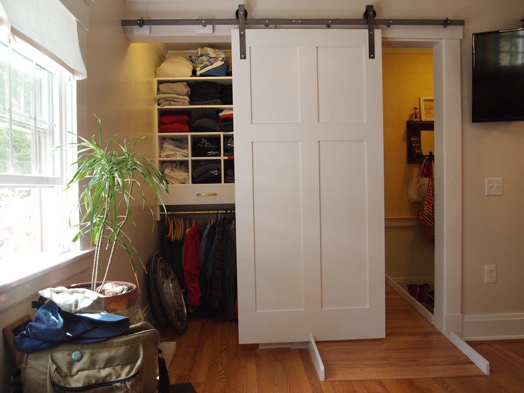 barn pocket door to cover closet and entry way 