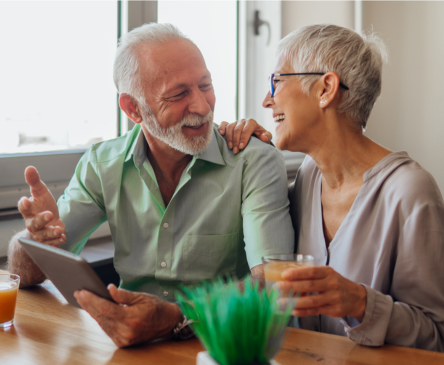 Older adult couple sitting and talking